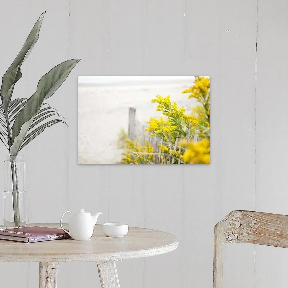 "Beach fence with yellow flowers" Canvas Wall Art