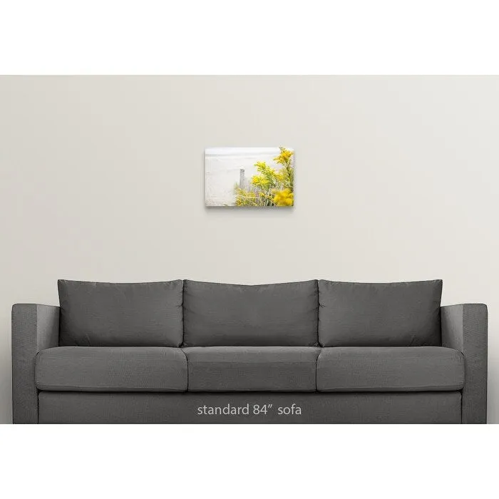 "Beach fence with yellow flowers" Canvas Wall Art